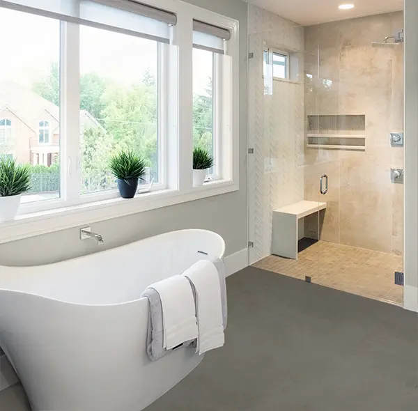 Bathroom with microcement on gray floor