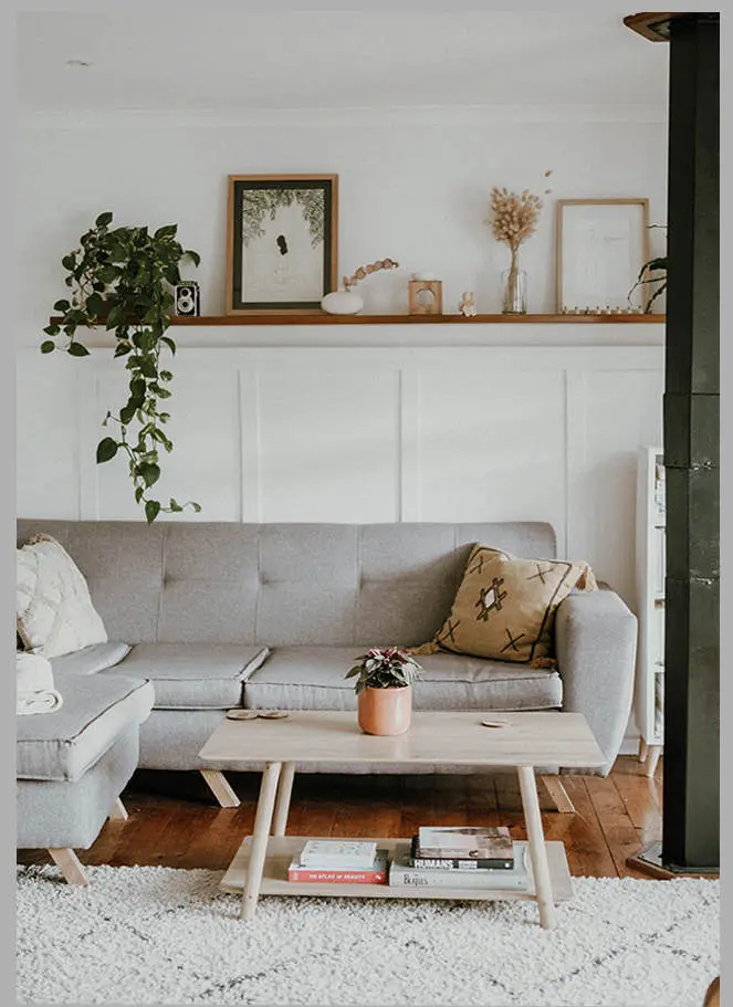 Living room with shelf above the sofa