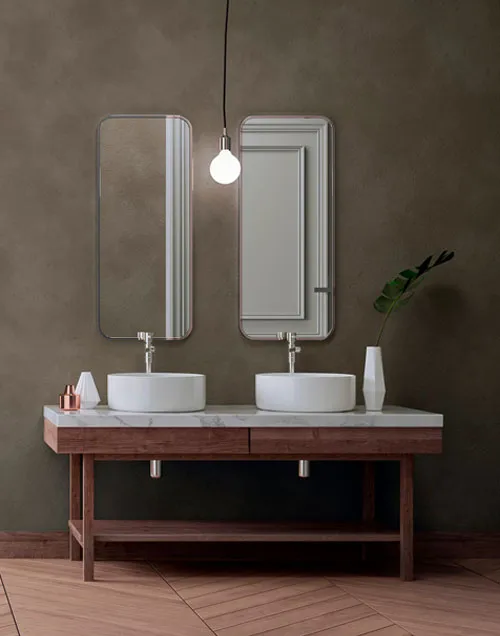 Bathroom with microcement and wooden furniture and marble