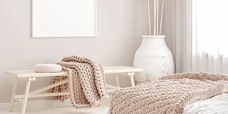 Bedroom with microcement decoration in light tones