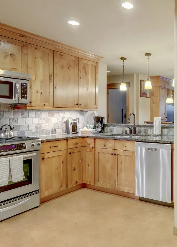 Beige microcement flooring in a kitchen