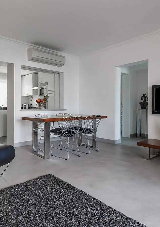 Dining room with polished cement flooring